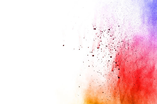 abstract powder splatted background. Colorful powder explosion on white background. Colored cloud. Colorful dust explode. Paint Holi. © kitsana