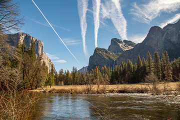 Yosemite Valley View of Merced River and Meadow with Jet Trails in the Sky Over Yosemite National...