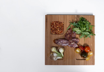 plate with salami and veges