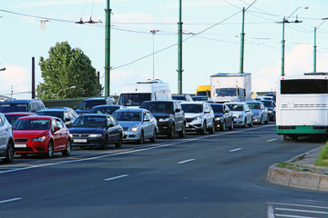 Fototapeta na wymiar cars, stood in traffic jam on the ramp from the bridge