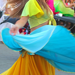 belly dance of a girl with blond hair