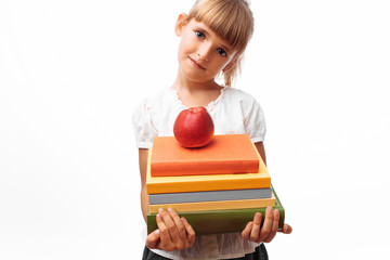 Baby girl holding a book with an Apple, school theme, in school uniform