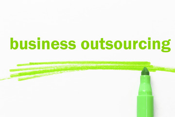 business outsourcing word written with green marker