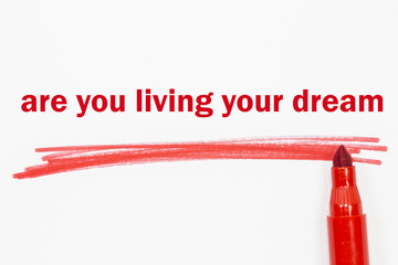 are you living your dream word written with red marker