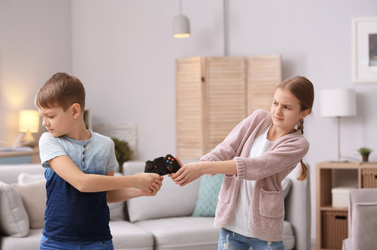 Brother Arguing With Sister At Home