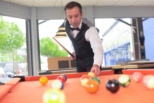 portrait of a professional snooker playing