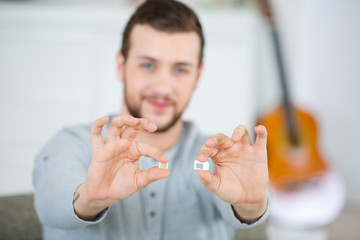 business man showing sim cards