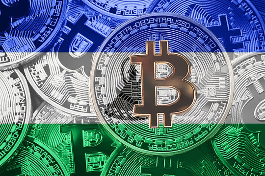 Stack of Bitcoin Lesotho flag. Bitcoin cryptocurrencies concept. BTC background.