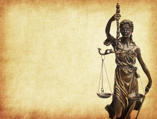 Statue of justice on old paper background, law concept