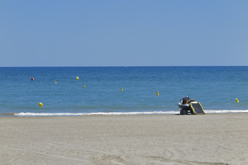 rescue jet ski in the shore of the beach