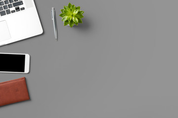 Office desktop with modern laptop and accessories