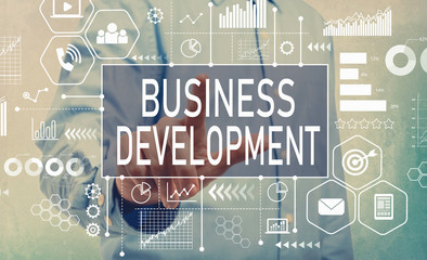 Business Development with businessman pointing digital screen