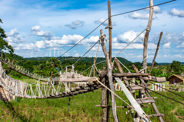 Wooden bridge on the rocks and a beautiful sky at Chaiyaphum in Thailand.