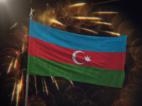 Flag of Azerbaijan with fireworks display in the background