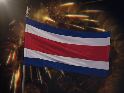 Flag of Costa Rica with fireworks display in the background
