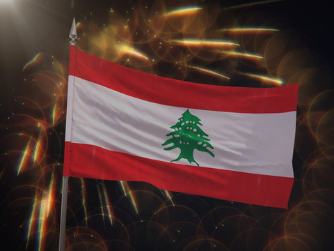 Flag of Lebanon with fireworks display in the background