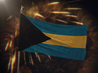 Flag of the Bahamas with fireworks display in the background