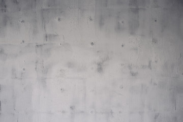 Fototapeta premium Rough surface of a concrete wall as a background texture