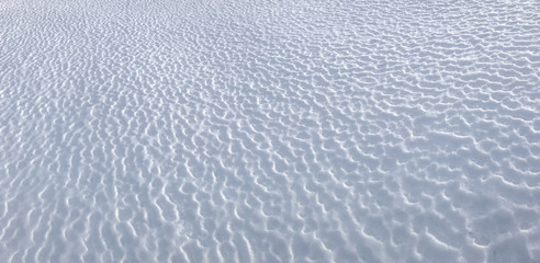 shapes on snow surfaces, wind, wear and storm effects
