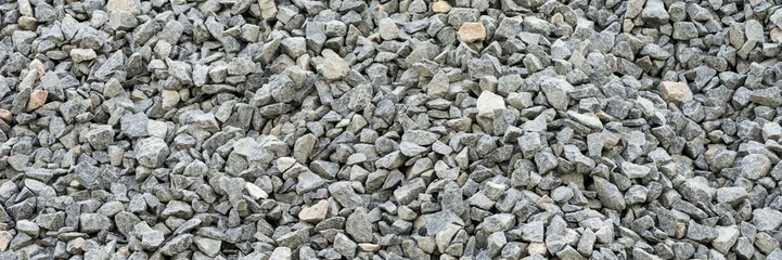 Foto op Canvas Gray gravel stones for the construction industry © kelifamily