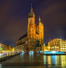 Fototapeta na wymiar Krakow, Poland-June 2018:St. Mary's Church on the old market square in Krakow