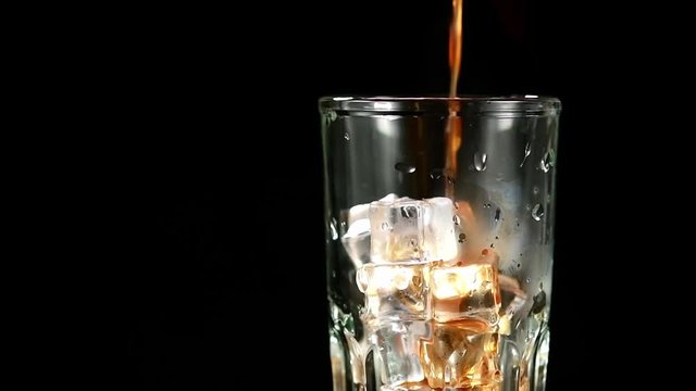 iced coffee on a black background closeup