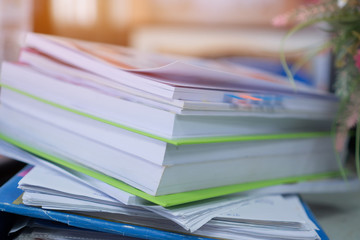 Paper stack, Pile of unfinished documents on office desk folders to business functions. Stack of business papers for Annual Report files, Document is written,drawn,presented. Business offices concept.