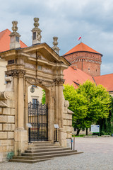 Fototapeta na wymiar Krakow, Poland - August 13, 2017: Krakow, beautiful gate in the Wawel Castle