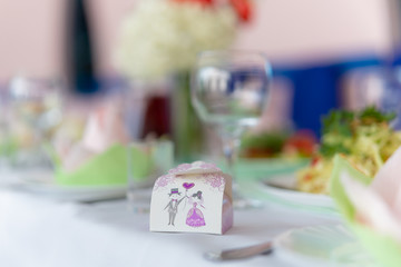 Naklejka na ściany i meble Gift wedding box on the festive table