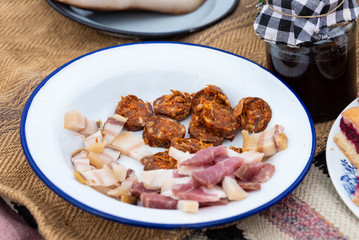 various chopped homemade dried meat products at the picnic