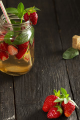 cocktail with fresh fruits, berries and mint