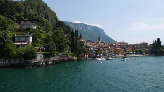 View of Varenna town one of the small beautiful towns on Como lake seen from ferry, Lombardy, Italy