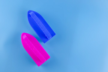 Plastic Scrub Brush on a Blue background
