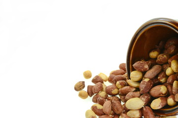 Salted peanuts isolated on white background.