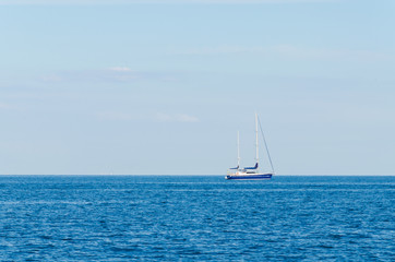 Obraz premium Seascape with white yacht on the sea in Odesa