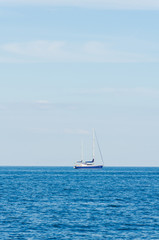 Obraz premium Seascape with white yacht on the sea in Odesa