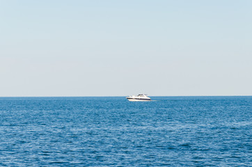 Obraz premium Seascape with white yacht on the sea in Odesa