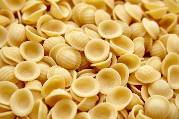 Dry Uncooked Orecchiette Italian Pasta . Food Background
