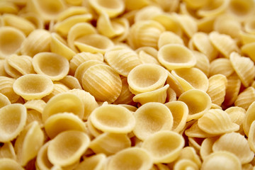 Dry Uncooked Orecchiette Italian Pasta . Food Background