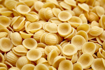 Dry Uncooked Orecchiette Italian Pasta . Food Background