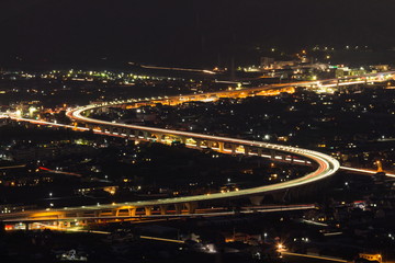 S-curve highway at night in takamatsu city,kagawa,shikoku,japan