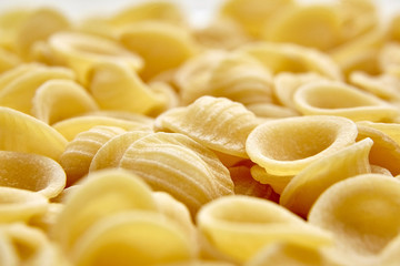 Dry Uncooked Orecchiette Italian Pasta . Food Background