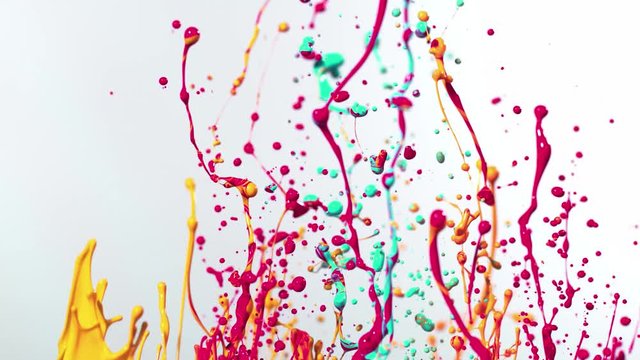 Colorful splashing paint in super slow motion. Shot with high speed cinema camera, 1000fps