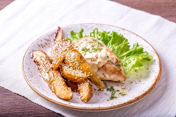 Tasty chicken breast with pear in  sesame seed
