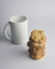 Cookies stack and white mug