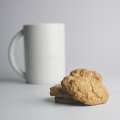 Cookies stack and white mug