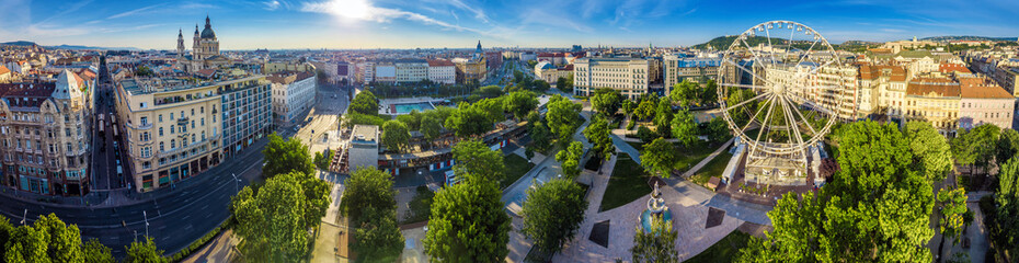 Budapest, Hungary - Aerial panoramic view of Elisabeth square (Erzsebet ter) at sunrise. This view includes St.Stephen's Basilica, Deak Square, Parliament, Buda Castle Royal Palace, Statue of Liberty