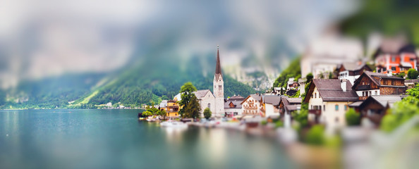 Panoramic view on Hallstatt mountain village. Miniature tilt shift lens effect.
