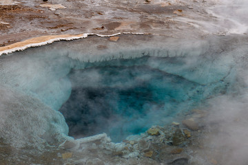 Hot thermal water pool in the Geysir park, Iceland