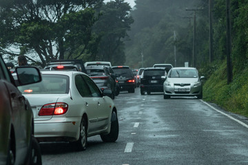 Fototapeta na wymiar Traffic Jam On Small Seaside Road In New Zealand 